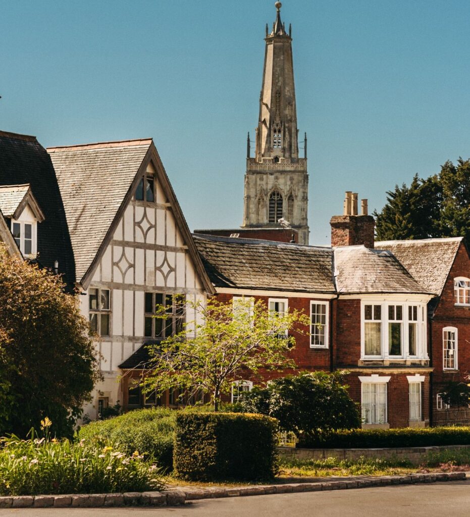 Gloucester homes with church in backround.